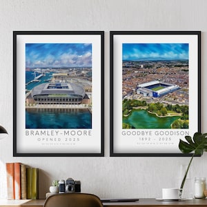 May include: Two framed prints featuring stadium art. One shows a modern stadium with the text "BRAMLEY-MOORE OPENED 2025". The other print displays a stadium with the text "GOODBYE GOODISON 1892 - 2025". Both prints have a blue sky background.