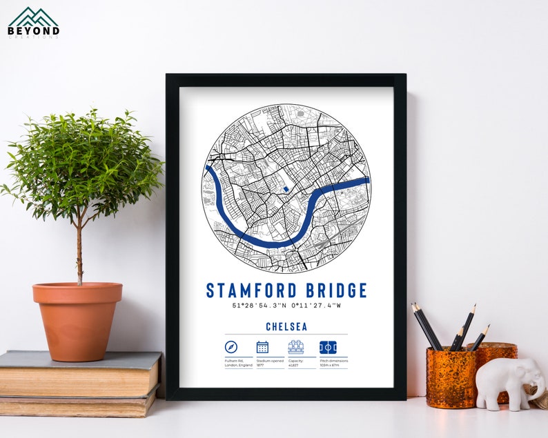 May include: A black framed print with a white background featuring a map of Stamford Bridge, the home of Chelsea Football Club. The map is in a circle with the coordinates 51&deg;28'54.3"N 0&deg;11'27.6"W and the text "Stamford Bridge, Chelsea" below the map. The print also includes icons for the stadium's location, capacity, and opening date.