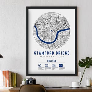 May include: A black and white map print of Stamford Bridge, a football stadium in Chelsea, London, England. The map shows the stadium's location and surrounding streets. The print includes the stadium's name, coordinates, and capacity.