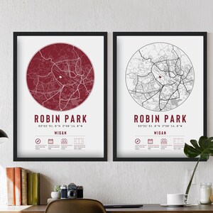 May include: Two framed prints featuring a map of Robin Park, Wigan. One print has a burgundy map on a white background, the other has a black and white map. The text "ROBIN PARK" and coordinates are displayed.