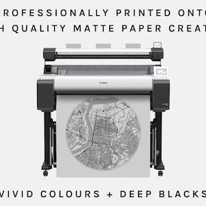 May include: A large format printer printing a black and white map on high quality matte paper. The printer is a Canon imagePROGRAF. The text "Professionally printed onto high quality matte paper creating vivid colours + deep blacks" is at the top of the image.