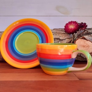 Hand painted rainbow coffee cup and saucer
