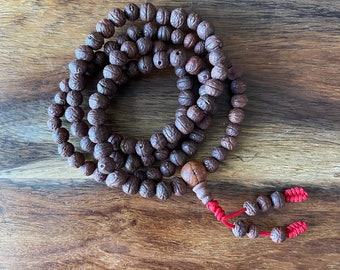 Buddhist prayer beads | Rako Japa Mala Lotus beads Natural