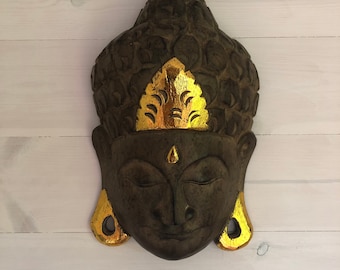 Masque de Bouddha en bois sculpté à la main