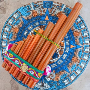 Instruments de musique à vent en bambou Pan Flûte. 6 tuyaux Son original  flûte en bambou. Style africain peint sur des pipes en bambou brillantes.  Par JNGcape -  Canada