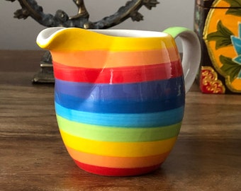 Hand painted rainbow stripe ceramic milk jug