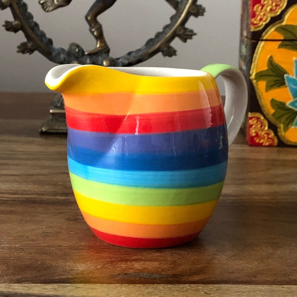 Hand painted rainbow stripe ceramic milk jug