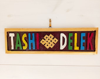 Enseigne tibétaine Tashi Delek en bois, décoration murale 30 x 9 cm