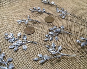 Wired silver sparkly dainty accent leaves x 10. Christmas wreath accessories. Christmas floral picks. Christmas craft supplies.