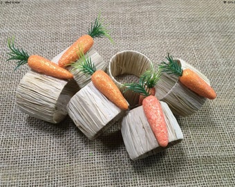 Easter bunny carrot napkin rings. Set of 6 napkin rings. Natural raffia finished with a mini glitter carrot. Fun dinner party decor.