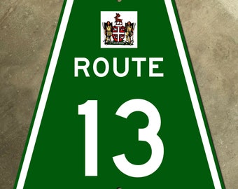 Znak drogowy autostrady Newfoundland Highway 13, herb Kanady z lat 60. XX wieku
