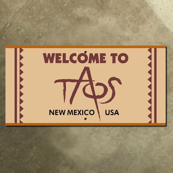 Taos New Mexico city limit boundary emblem highway marker road sign 1999