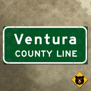 May include: Green and white rectangular sign with the text "Ventura County Line" in white letters.