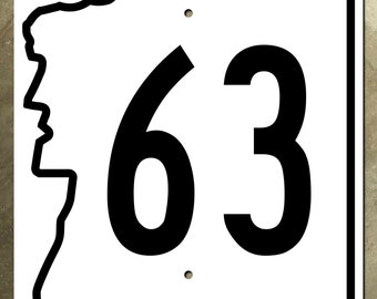 New Hampshire state route 63 highway road sign Old Man of the Mountain 1983