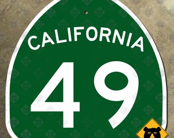 California state route 49 highway marker road sign gold rush Sierras 1964