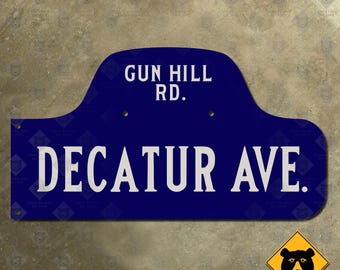 New York City Decatur Avenue Gun Hill Road humpback street sign