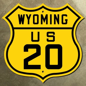 Wyoming US 20 highway route marker shield road sign Yellowstone Trail yellow