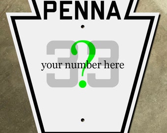 May include: A white Pennsylvania road sign with black lettering and a black border. The sign says "PENNA" at the top and "3?3" in the center with the text "your number here" below the numbers.