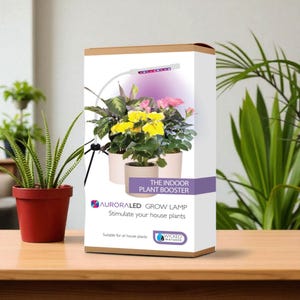 May include: A box for an indoor plant booster with the text "AURORALED GROW LAMP". The box shows potted plants under a grow lamp. The plants include yellow and pink flowers. A potted plant is on the left.