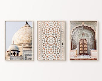May include: Three framed prints showcasing architectural details. The left print features a white domed structure. The central print displays a detailed mosaic pattern. The right print depicts an arched doorway with ornate carvings.