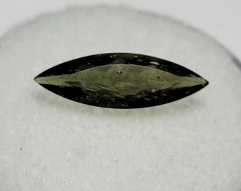 Authentic natural faceted Moldavite 1.25 carats oval shaped about 15x5x3mm