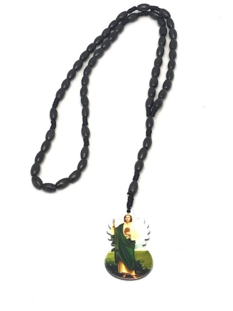 Beautiful black wood stones with Jesus charm rosary style necklace