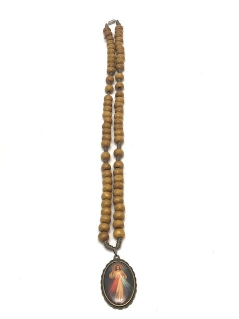 Heart of Jesus charm with light brown wood beads and screw closer necklace