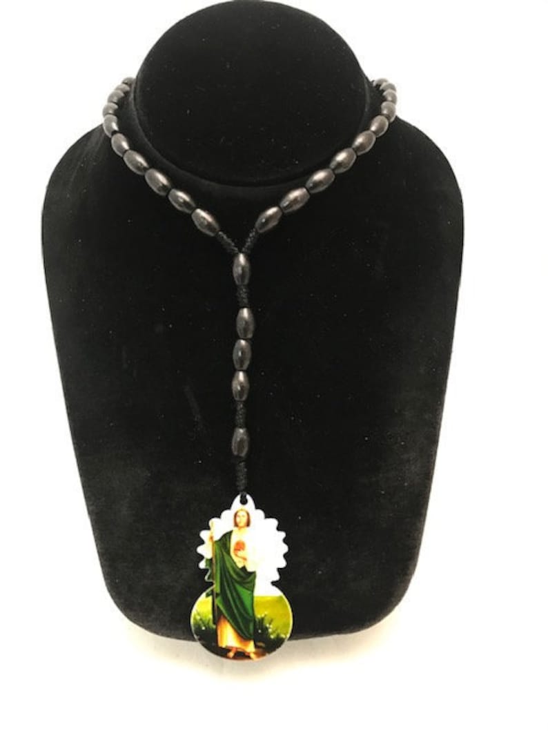 Beautiful black wood stones with Jesus charm rosary style necklace