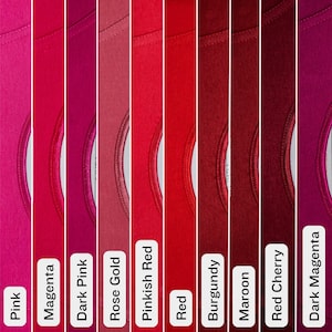 May include: A color palette of various shades of pink and red t-shirts. The colors range from light pink to dark magenta, with labels identifying each shade: Pink, Magenta, Dark Pink, Rose Gold, Pinkish Red, Red, Burgundy, Maroon, Red Cherry, and Dark Magenta.