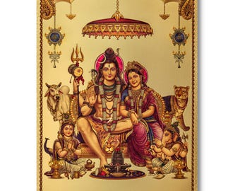 May include: A gold-toned religious artwork featuring a seated couple with multiple figures and animals. The artwork has a decorative border and includes text at the bottom that reads "Rangoli 187" and "999 Gold".
