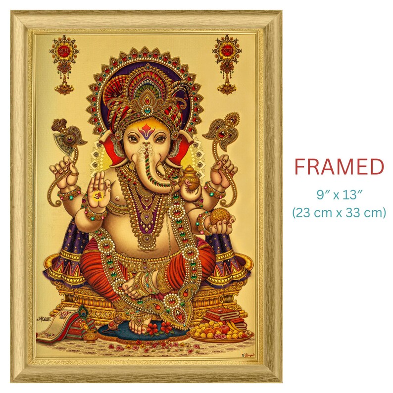 May include: Framed artwork featuring a detailed illustration of the Hindu deity Ganesha. The artwork is rich in color, with gold, red, and purple hues dominating the image. The framed piece measures 9" x 13".