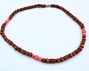 Brown Tulsi Wood Necklace: Radha Engraved Beads, Pink Coral Gemstone