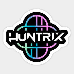 May include: A sticker with the word "HUNTRIX" in white, bold, sans-serif font. The word is set against a black background with a stylized, multi-colored design in shades of blue, purple, and green.