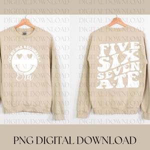 May include: A beige sweatshirt with a white design on the front and back. The front design is a smiley face with hearts for eyes and the text "For My NCAA Nationals Era". The back design is the numbers "Five Six Seven Ate" in a retro font.