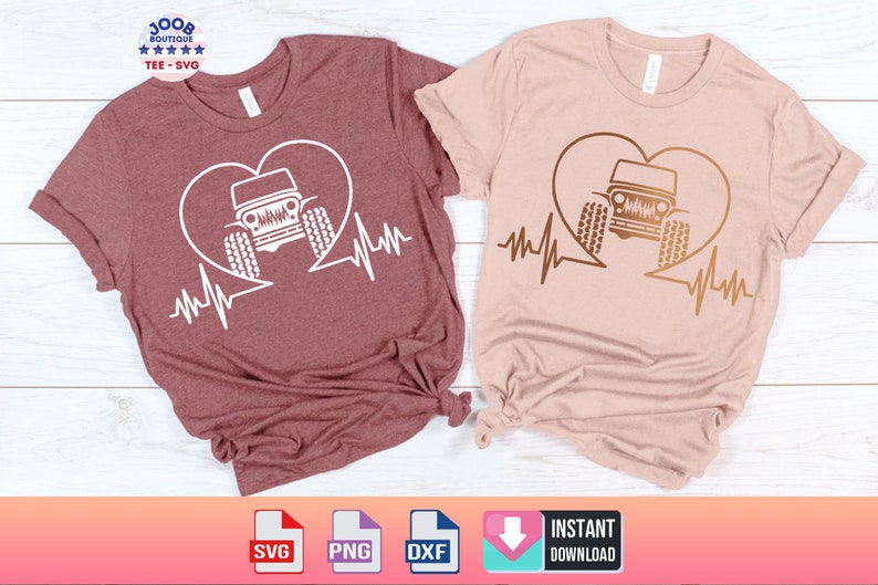 May include: Two t-shirts with a heart and a jeep inside the heart with a heartbeat line underneath. The t-shirt on the left is maroon and the t-shirt on the right is light pink.