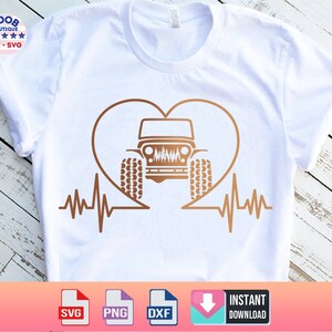 May include: A white t-shirt with a brown heart-shaped outline containing a jeep silhouette. The jeep has a brown grill and brown tires. A brown heartbeat line is below the heart.