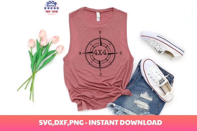 May include: A pink sleeveless tank top with a black compass design featuring the text "4x4" in the center. The compass points are labeled N, S, E, and W.