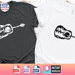 May include: Two t-shirts, one dark gray and one white, each featuring a guitar-shaped design. The design is a silhouette of a forest scene with trees, a lake, and a sun. The dark gray shirt has a circular logo that says "100B BOUTIQUE TEE - SVG".