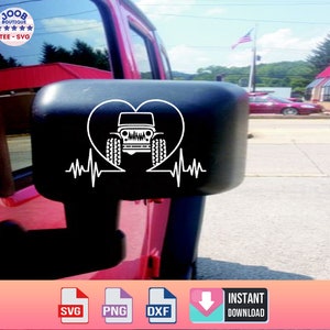 May include: A red Jeep Wrangler with a white heart and heartbeat graphic on the side mirror. The graphic includes a Jeep Wrangler silhouette inside the heart. The image includes the text "Joob Boutique Tee-SVG".