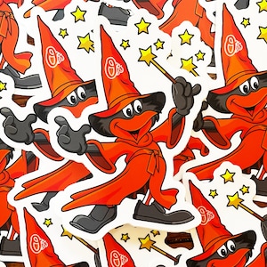 May include: A pile of colorful stickers featuring a cartoon bird wearing a red wizard hat and holding a magic wand. The stickers have a white background and feature the text "O's" on the hat.