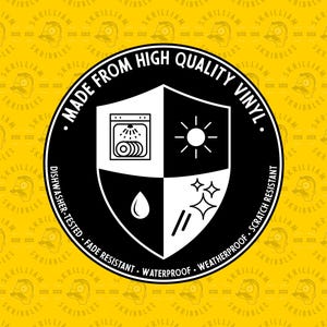 May include: A circular black and white sticker featuring a shield icon divided into four quadrants with symbols for dishwasher safety, sun exposure, water resistance, and scratch resistance, with text reading MADE FROM HIGH QUALITY VINYL.
