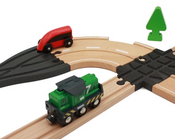 Points and crossings for wooden roads and trains compatible with Brio