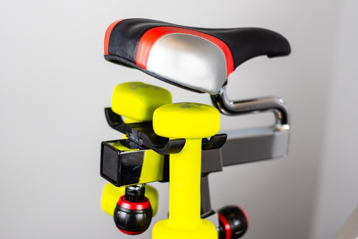 dumbell holder for spin bike