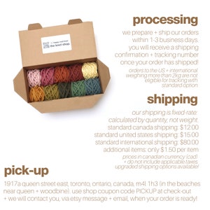May include: A box filled with colourful cotton yarn skeins in shades of pink, red, orange, yellow, green, and brown. The box is labelled "the knot shop." The text "pick-up" is at the bottom of the image, along with the address "1917a queen street east, toronto, ontario, canada, m4l 1h3 (in the beaches near queen + woodbine). use shop coupon code PICKUP at check-out + we will contact you, via etsy message + email, when your order is ready!"