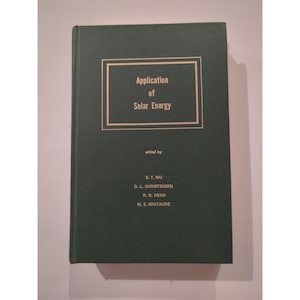 May include: A hardcover book titled "Application of Solar Energy." The cover is dark green with a gold-colored rectangular frame containing the title. Below the title, the book lists the editors: S. T. Wu, D. L. Christensen, R. R. Head, and W. E. Whitacre.