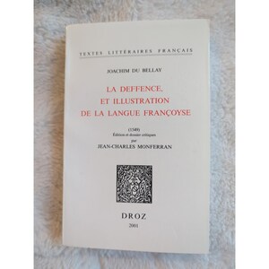 May include: A white book with black text on the cover. The title is "La Deffence, et Illustration de la Langue Françoyse" by Joachim du Bellay. The book was published in 2001 by Droz.
