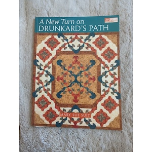 A New Turn on Drunkards Path SC Traje de Mary Sue That Patchwork Place Signed