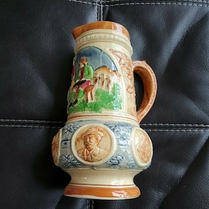 Large “K” glazed, hand painted 10.5” pitcher w/raised designs, 6.5&quot; wide, Japan