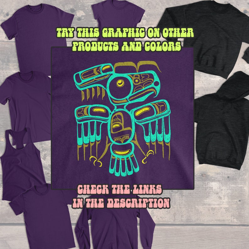 Puede incluir: Camiseta morada con un dise&ntilde;o inspirado en los nativos americanos en color turquesa y dorado de un p&aacute;jaro con las alas extendidas. El texto "TRY THIS GRAPHIC ON OTHER PRODUCTS AND COLORS" est&aacute; por encima del dise&ntilde;o y el texto "CHECK THE LINKS IN THE DESCRIPTION" est&aacute; por debajo del dise&ntilde;o.