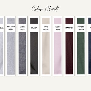 Pu&ograve; includere: Tabella colori che mostra 12 colori di tessuto diversi: bianco, avena, grigio melange, grigio scuro, nero, beige sabbia, rosa chiaro, bordeaux, verde bosco, blu navy e blu bambino.